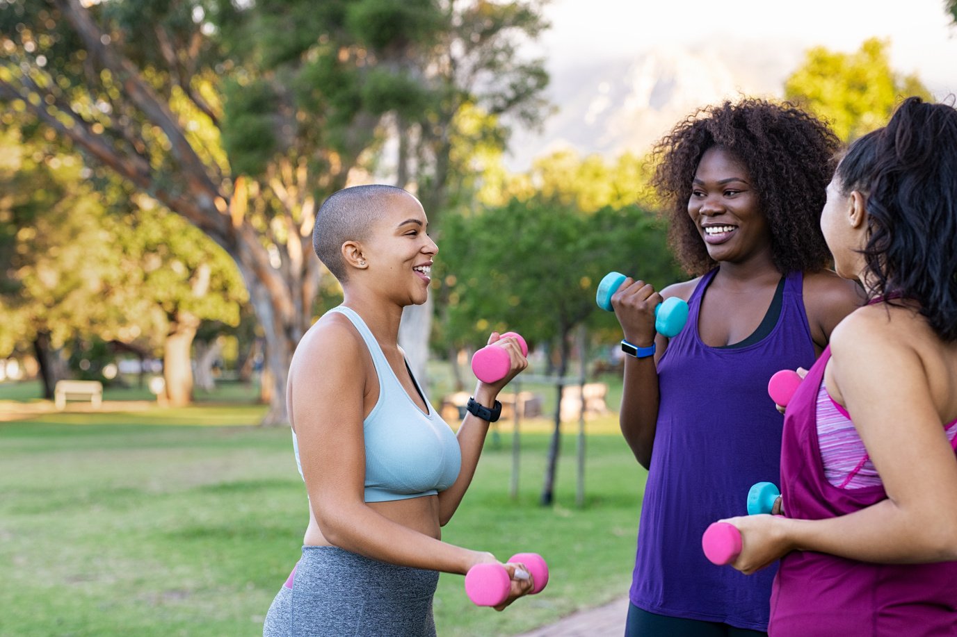 Oversize Women Using Dumbbells